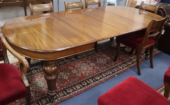 A Victorian mahogany extending dining table 230cm extended (two spare leaves)